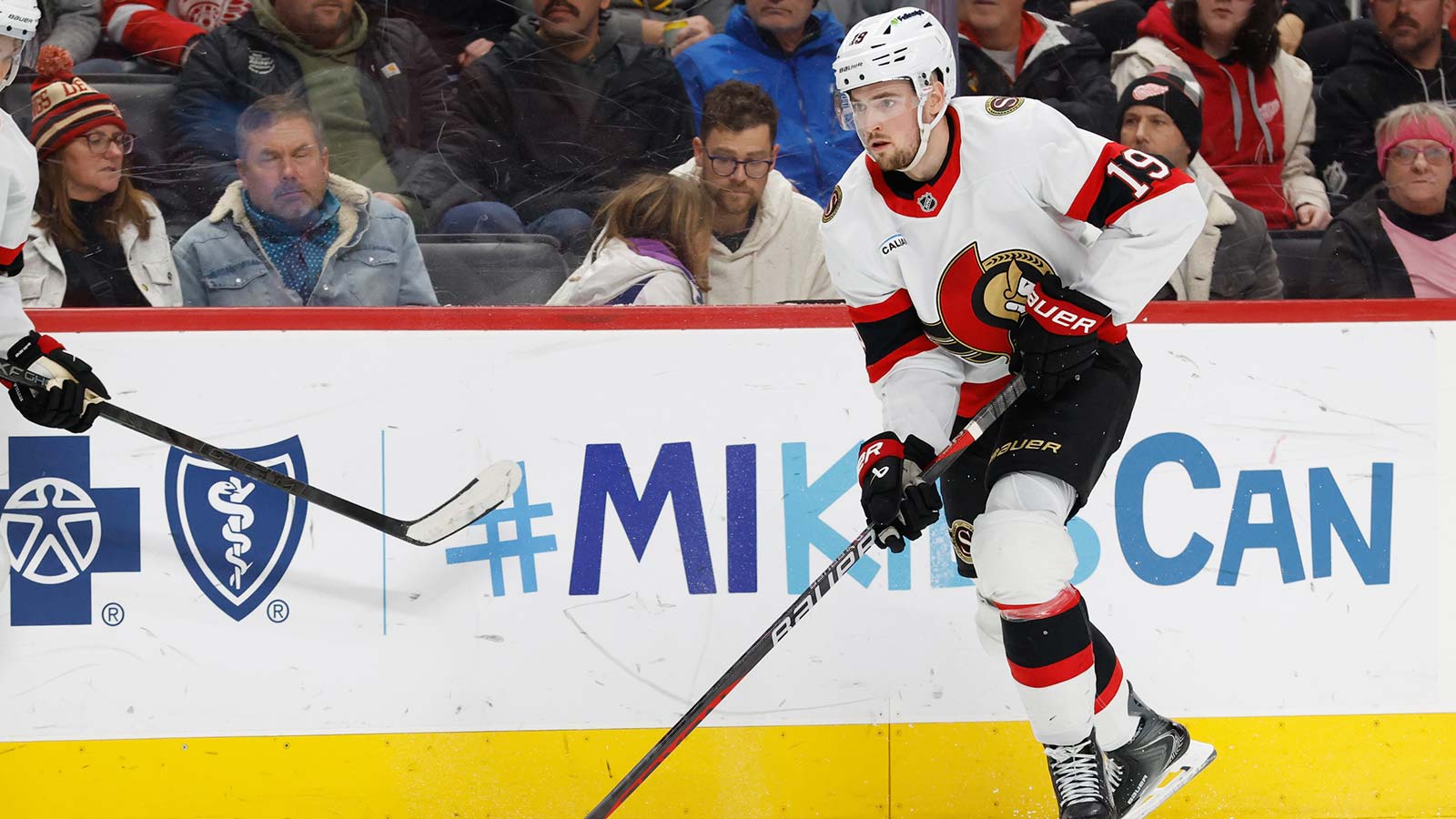 Ottawa Senators right wing Drake Batherson (19) skates with the puck in the first period against the Detroit Red Wings at Little Caesars Arena.