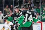 Dallas Stars center Wyatt Johnston (53) celebrates a goal with left wing Jamie Benn (14) and...