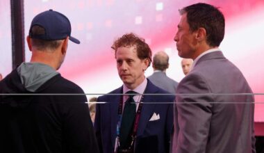 Tom Dundon, left, Eric Tulsky, center, and Rod Brind'Amour chat during the 2024 NHL Draft at Sphere on June 29, 2024, in Las Vegas, Nevada.