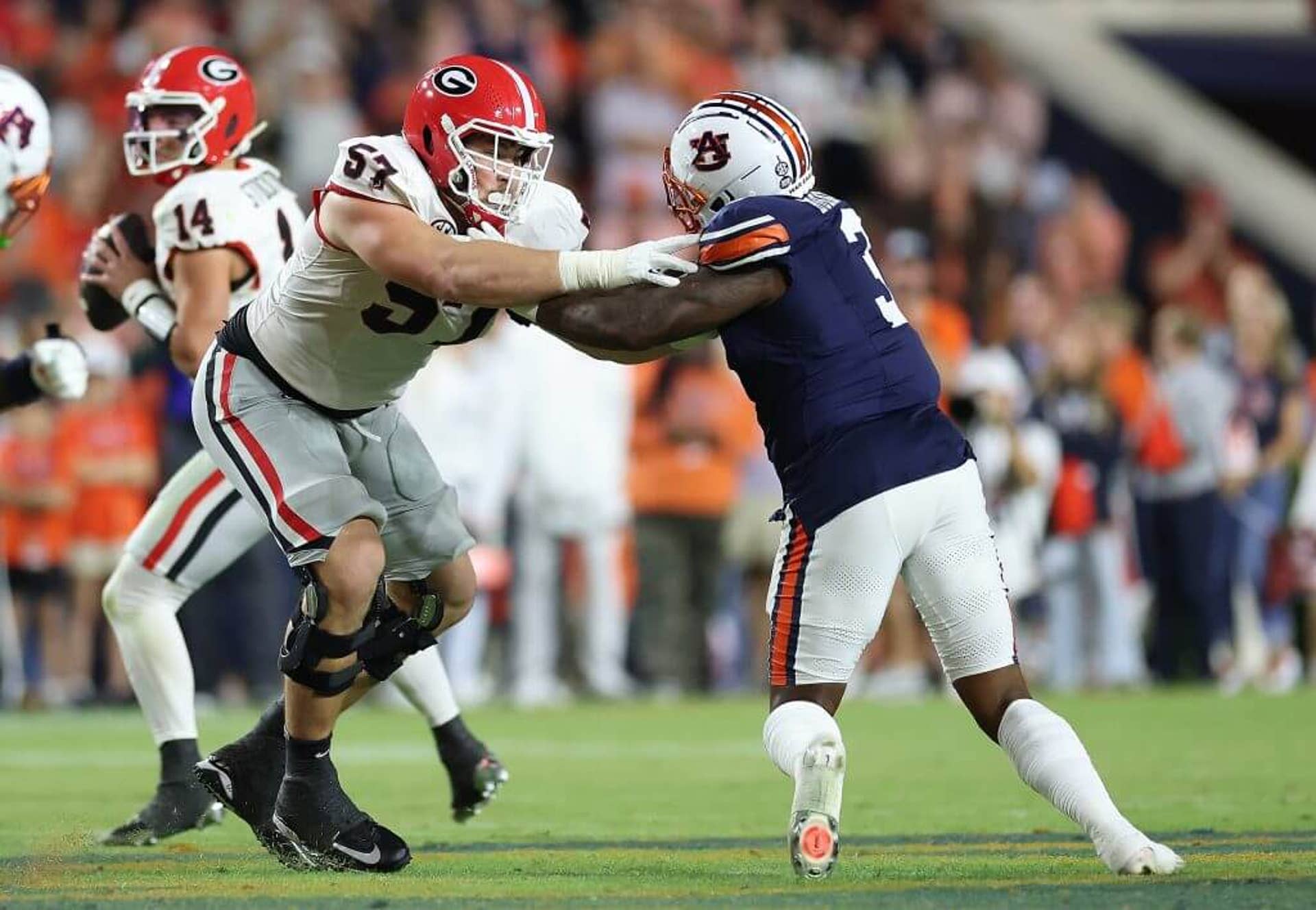 Georgia offensive tackle Monroe Freeling blocks Chris Murray during a game against Auburn