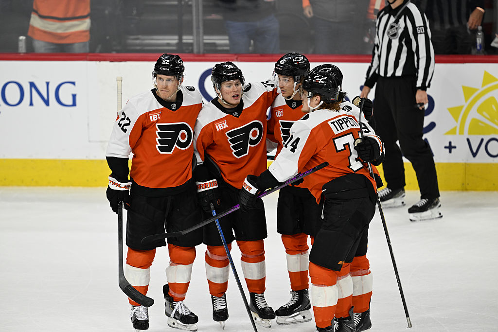 PHILADELPHIA , PA - MARCH 24: Philadelphia Flyers center Christian Dvorak #22, Philadelphia Flyers right wing Matvei Michkov #39, Philadelphia Flyers right wing Owen Tippett #74 and Philadelphia Flyers center Trevor Zegras #46 celebrate during the game between the Philadelphia Flyers and the Columbus Blue Jackets on March 24th, 2026 at the Xfinity Mobile Arena in Philadelphia, PA. (Photo by Terence Lewis/Icon Sportswire via Getty Images)