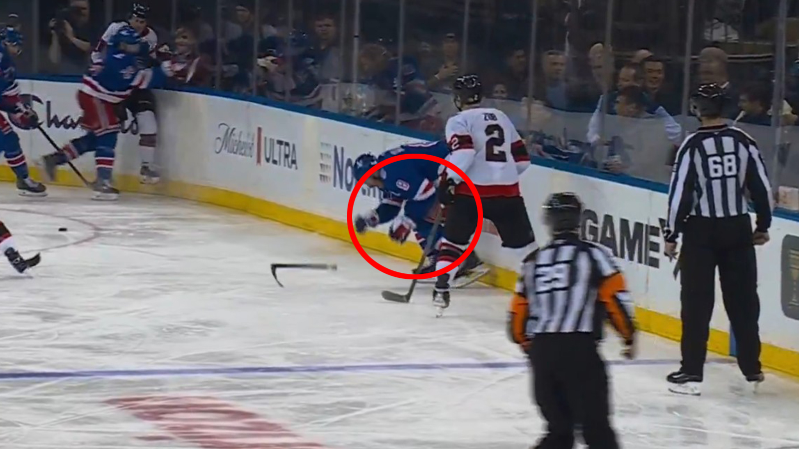 JT Miller in pain after taking a shot