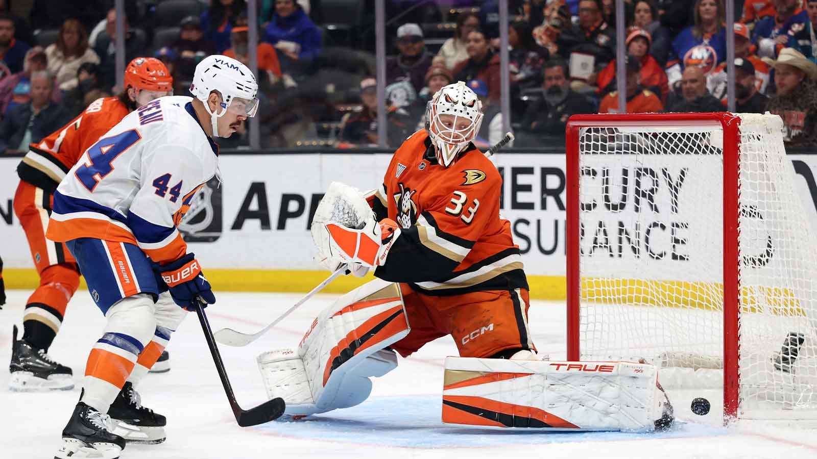 Anaheim Ducks goaltender Ville Husso (33) defends the goal against New York Islanders center Jean-Gabriel Pageau (44) during the third period at Honda Center. 