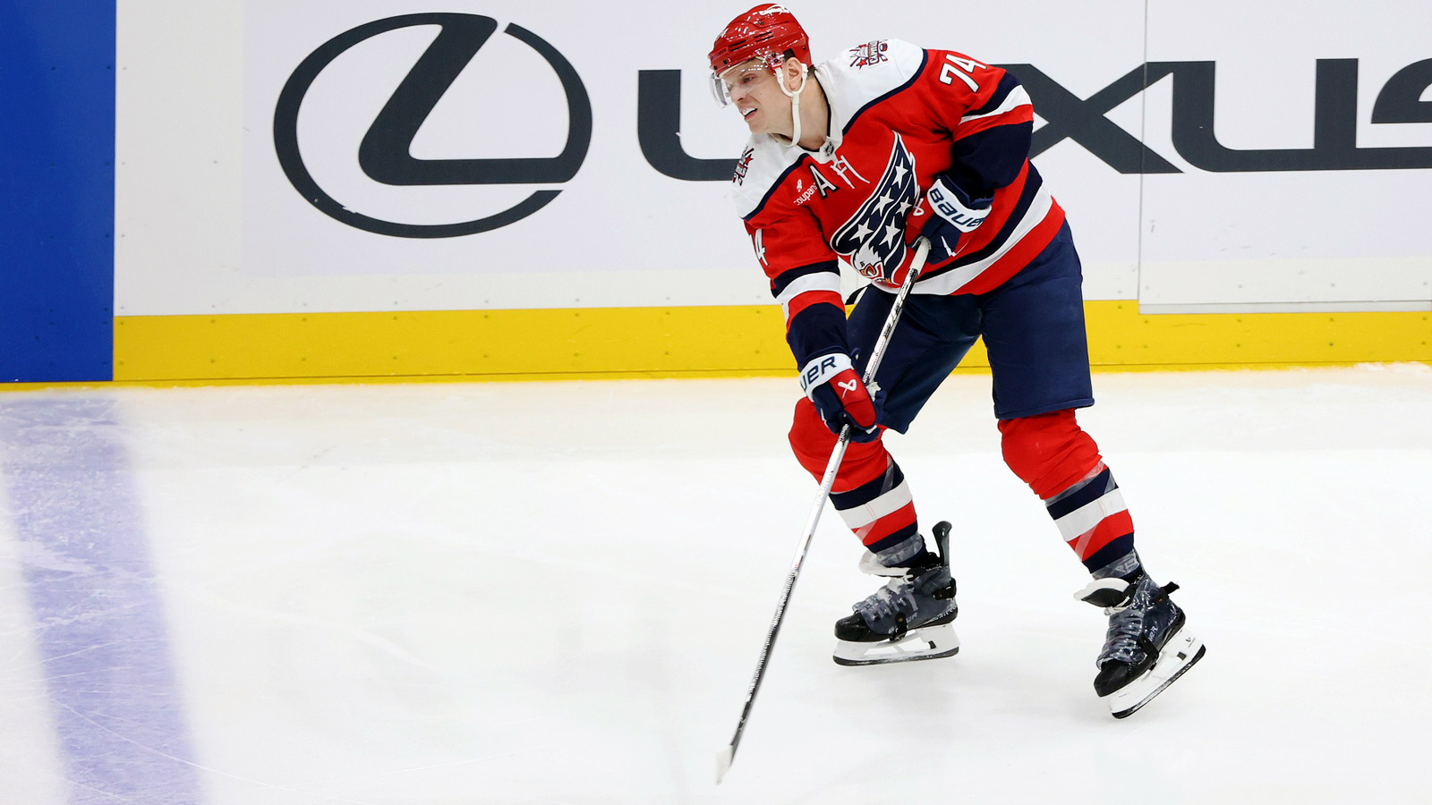 Washington Capitals defenseman John Carlson (74) passes the puck during the third period against the Carolina Hurricanes at Capital One Arena. 