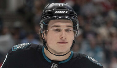 Macklin Celebrini staring on the ice