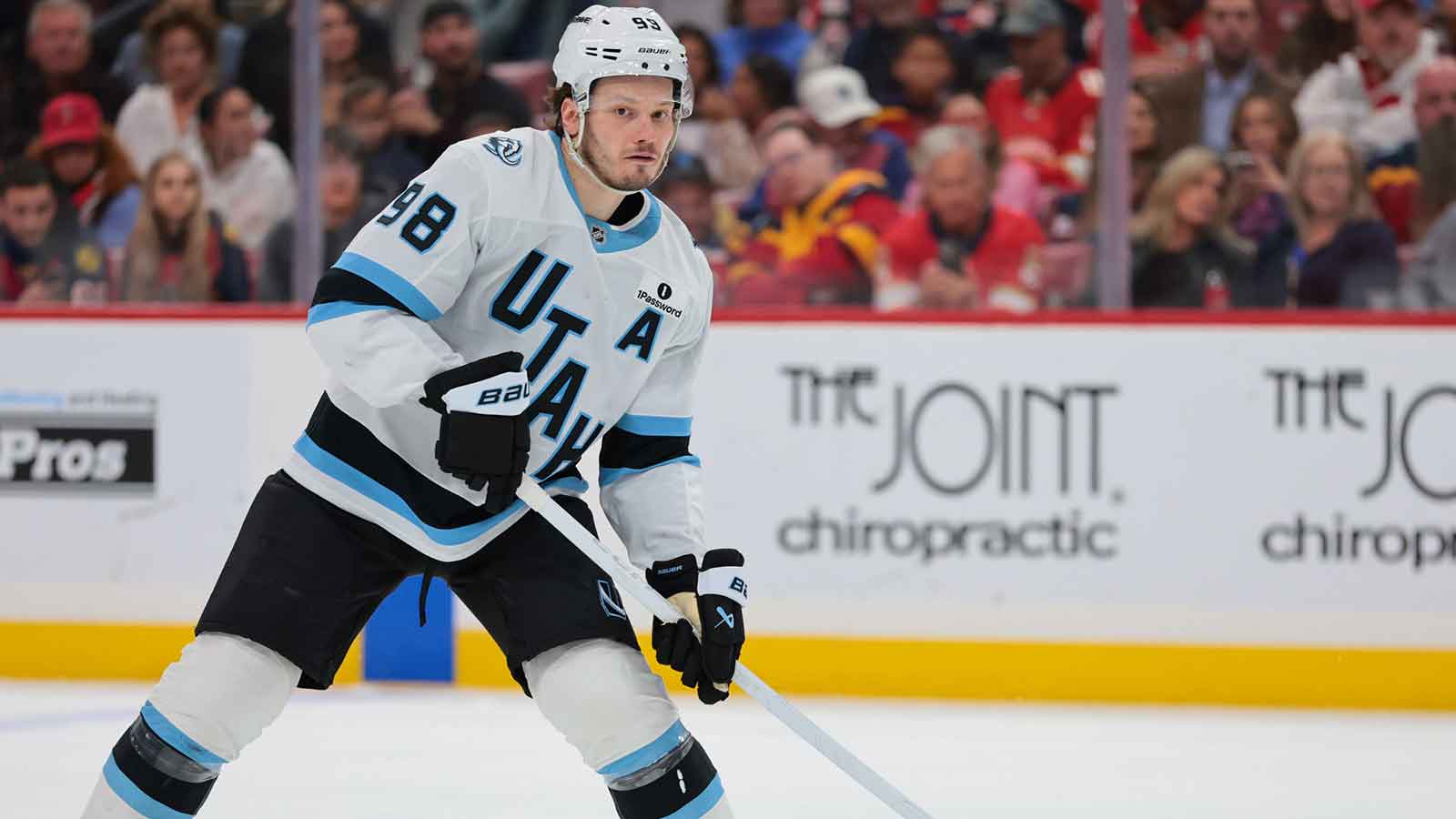Utah Mammoth defenseman Mikhail Sergachev (98) moves the puck against the Florida Panthers during the second period at Amerant Bank Arena. 