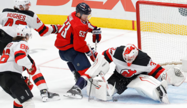 New Jersey Devils goaltender Jake Allen makes a save on Ethan Frank in the third period.
