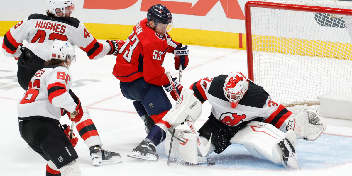 New Jersey Devils goaltender Jake Allen makes a save on Ethan Frank in the third period.