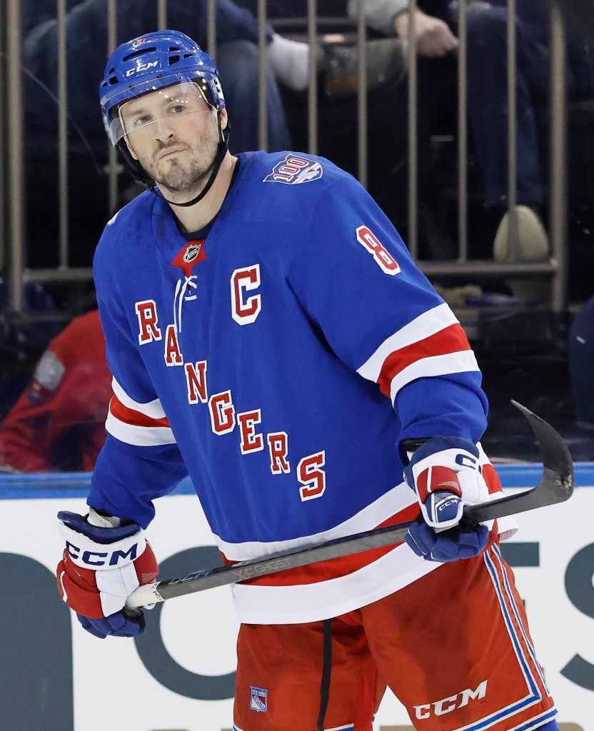New York Rangers center J.T. Miller reacts on the ice.