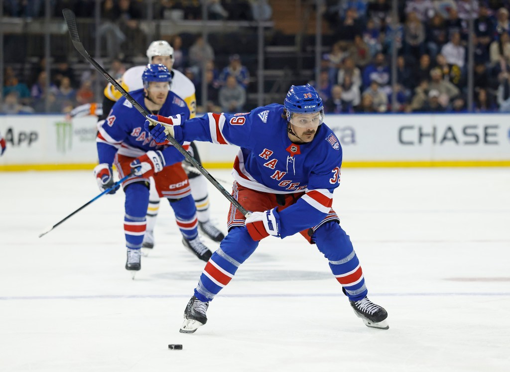 New York Rangers center Sam Carrick takes a shot.
