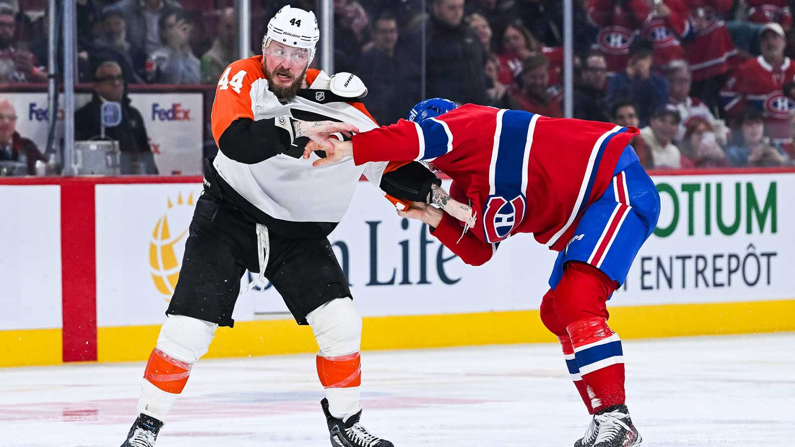 Philadelphia Flyers left wing Nicolas Deslauriers (44) fights against Montreal Canadiens defenseman Arber Xhekaj (72) during the third period at Bell Centre. 