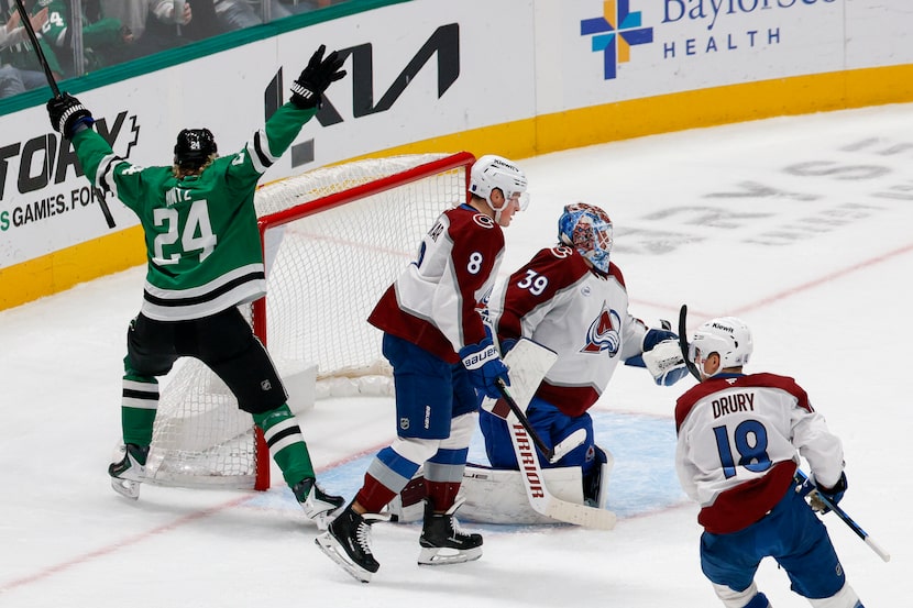 Dallas Stars center Roope Hintz (24) reacts after center Wyatt Johnston scores a goal during...