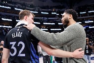 Dallas Mavericks forward Cooper Flagg (32) greets Boston Celtics forward Jayson Tatum after...