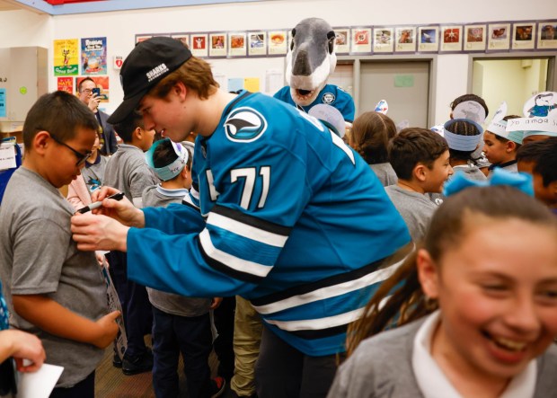 San Jose Sharks' Macklin Celebrini signs autographs at Bachrodt Elementary in San Jose, Calif., on Thursday, March 5, 2026. (Shae Hammond/Bay Area News Group)