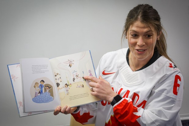 Rebecca Johnston, four-time Canadian Olympic medalist in women's ice hockey, reads to a class at Bachrodt Elementary in San Jose, Calif., on Thursday, March 5, 2026. (Shae Hammond/Bay Area News Group)