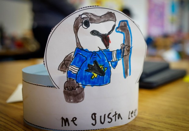 A hat colored by a student with San Jose Sharks' mascot S.J. Sharkie sits on a desk at Bachrodt Elementary in San Jose, Calif., on Thursday, March 5, 2026. (Shae Hammond/Bay Area News Group)