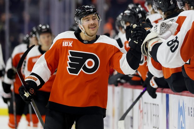 Bobby Brink celebrates with teammates.