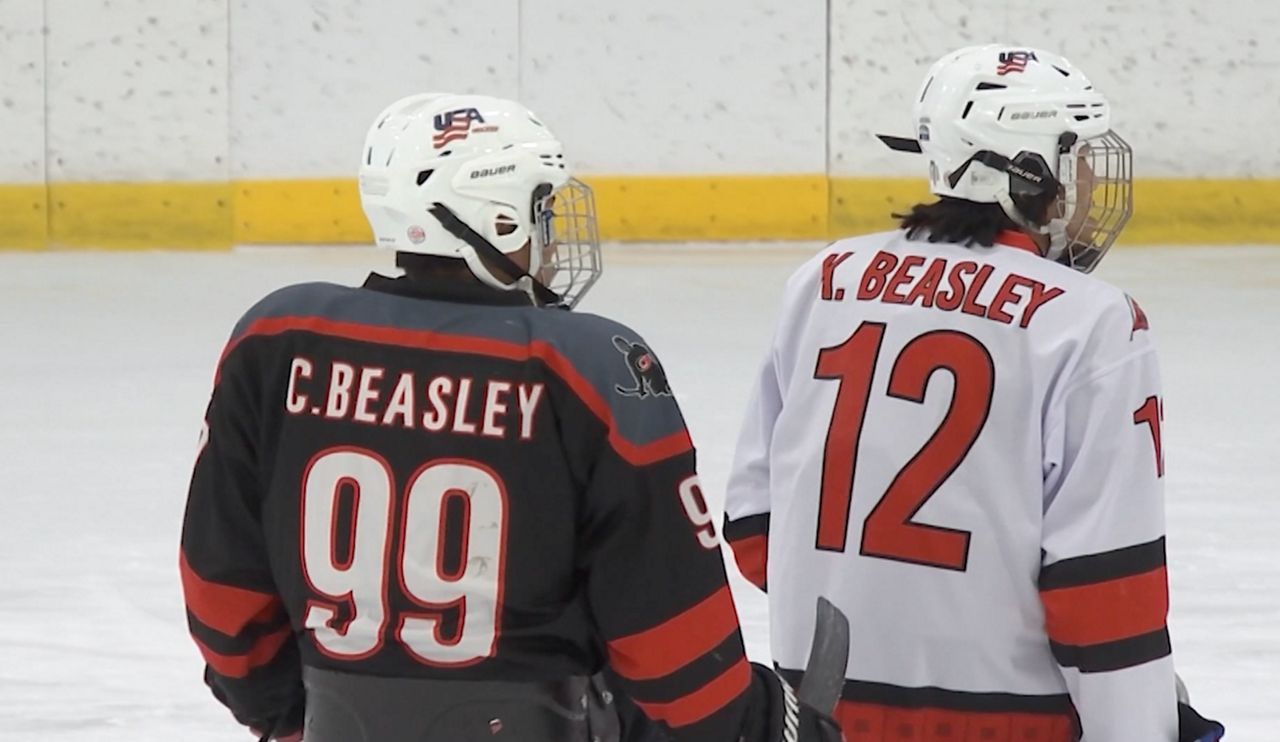 Kayden and his brother Caleb at practice in 2025. (Spectrum News 1)