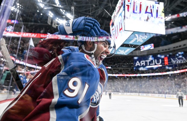 Nazem Kadri (91) of the Colorado Avalanche celebrates scoring his second goal against the Calgary Flames during the first period at Ball Arena in Denver on Monday, March 30, 2026. (Photo by AAron Ontiveroz/The Denver Post)