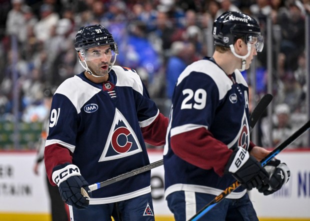 Nazem Kadri (91) of the Colorado Avalanche speaks to Nathan MacKinnon (29) during the third period of the Avs' shootout win over the Minnesota Wild at Ball Arena in Denver on Sunday, March 8, 2026. (Photo by AAron Ontiveroz/The Denver Post)