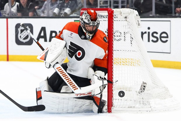 Philadelphia Flyers goaltender Samuel Ersson stops the puck during a game against the Los Angeles Kings, Thursday, March 19, 2026, in Los Angeles. (AP Photo/Jessie Alcheh)