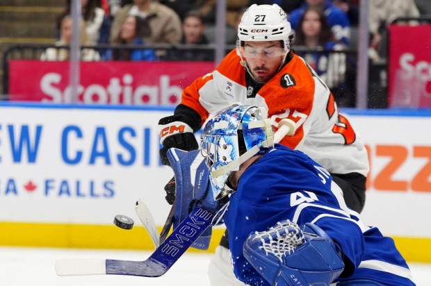 Toronto Maple Leafs goaltender Anthony Stolarz stops Philadelphia Flyers' Noah Cates during first-period action on Monday, March 2, 2026, in Toronto. (Frank Gunn/The Canadian Press via AP)