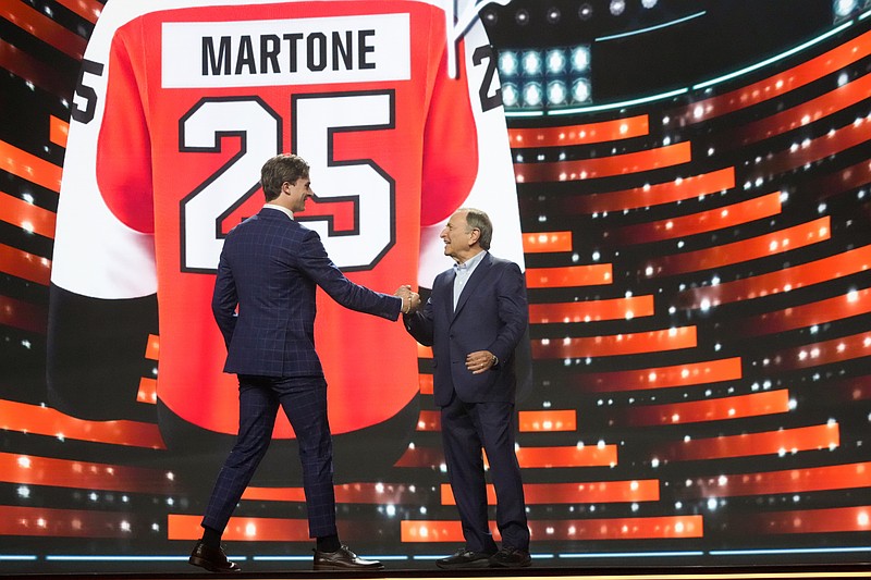 Jun 27, 2025; Los Angeles, California, USA; Porter Martone is selected as the sixth overall pick to the Philadelphia Flyers in the first round of the 2025 NHL Draft at Peacock Theater. Mandatory Credit: Kirby Lee-Imagn Images