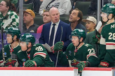 Minnesota Wild head coach John Hynes reacts on the bench during 2025 game.