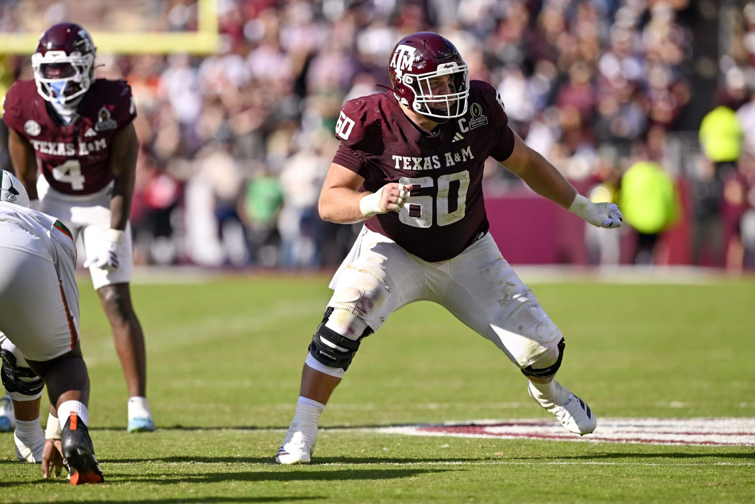 Trey Zuhn III gets into a blocking stance.