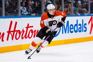 Philadelphia Flyers forward Owen Tippett skates with the puck during 2026 game.
