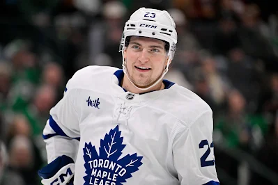 Toronto Maple Leafs forward Matthew Knies reacts during 2025 game.