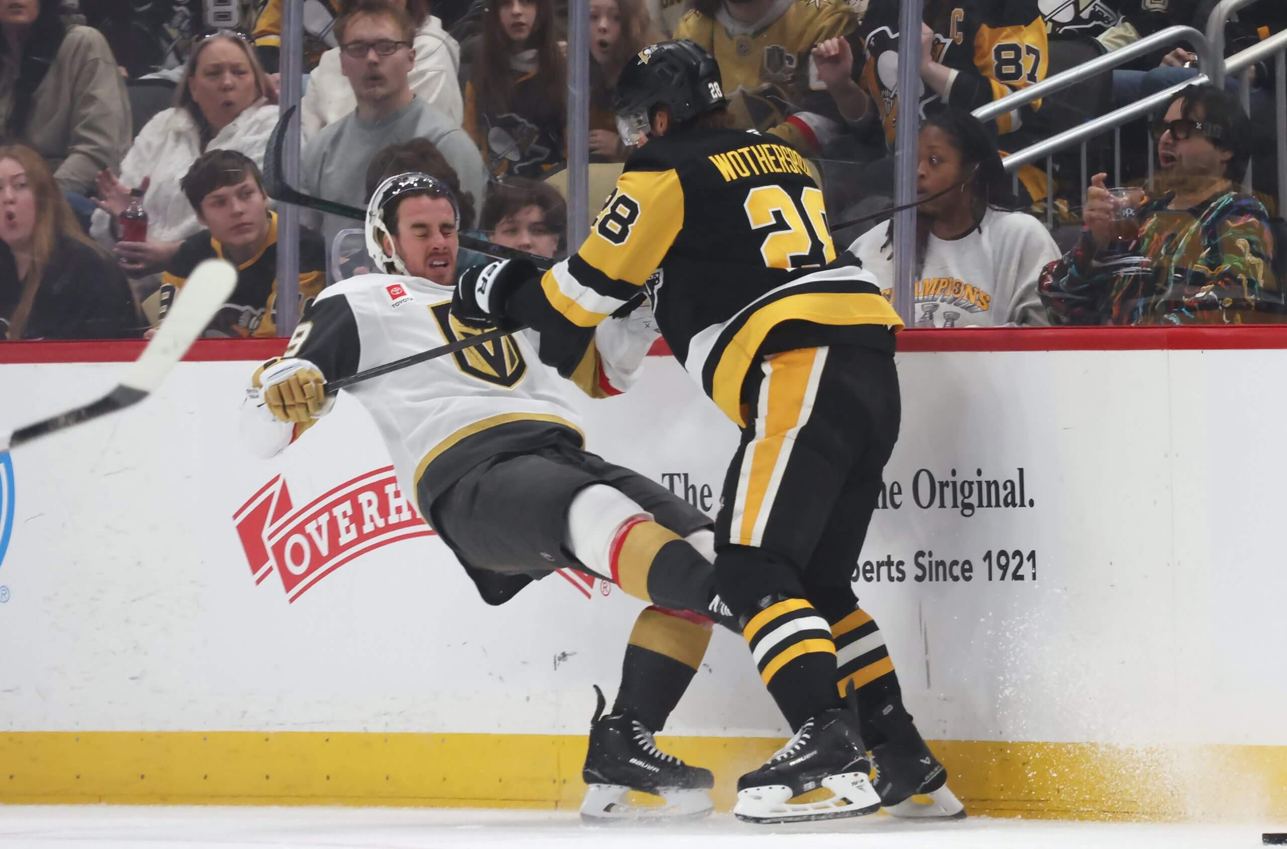 Pittsburgh's Parker Wotherspoon checks Vegas' Reilly Smith, pushing him off balance.
