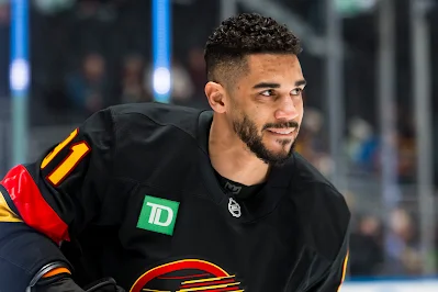 Vancouver Canucks forward Evander Kane reacts before 2026 game.