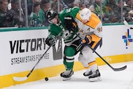 Nashville Predators center Ryan O'Reilly (90) and Dallas Stars center Wyatt Johnston (53)...