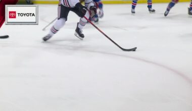 Garand stops 27 for first NHL win as Rangers down Blackhawks 6-1