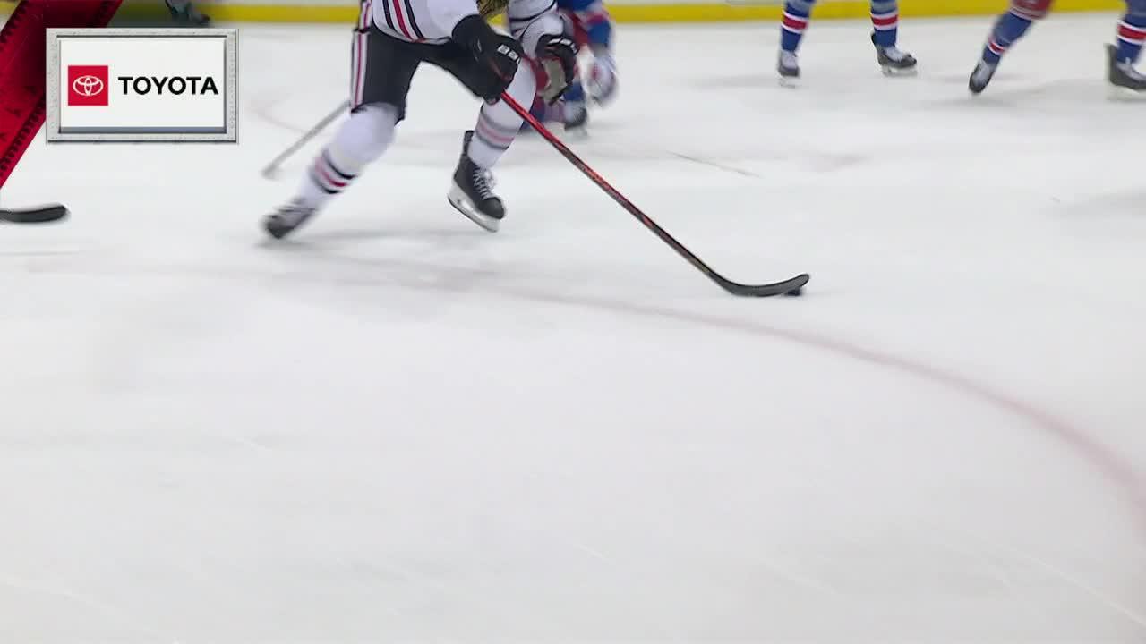 Garand stops 27 for first NHL win as Rangers down Blackhawks 6-1