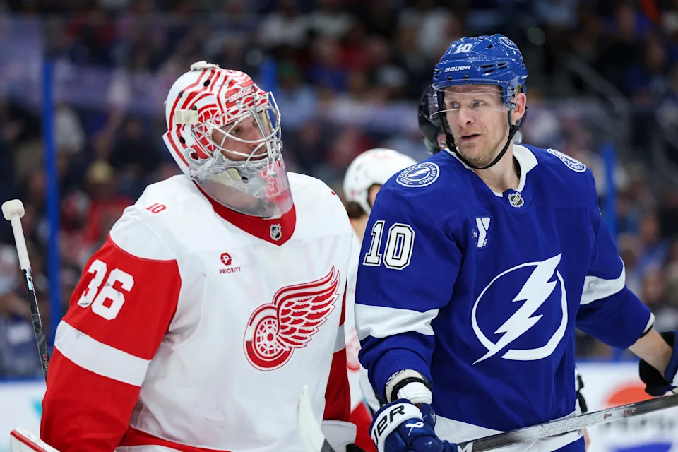 Mar 12, 2026; Tampa, Florida, USA; Tampa Bay Lightning right wing Corey Perry (10) looks to Detroit Red Wings goaltender John Gibson (36) in the first period at Benchmark International Arena. Mandatory Credit: Nathan Ray Seebeck-Imagn Images