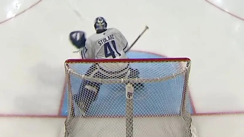 Maple Leafs goalie Anthony Stolarz takes a puck to the throat during warmups on March 21, 2026. Sportsnet