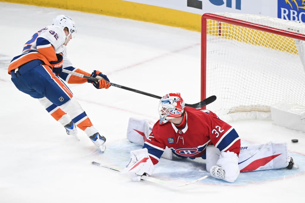 Simon Holmstrom scores on Jacob Fowler during the first period of the Islanders’ road blowout loss to the Canadiens. AP