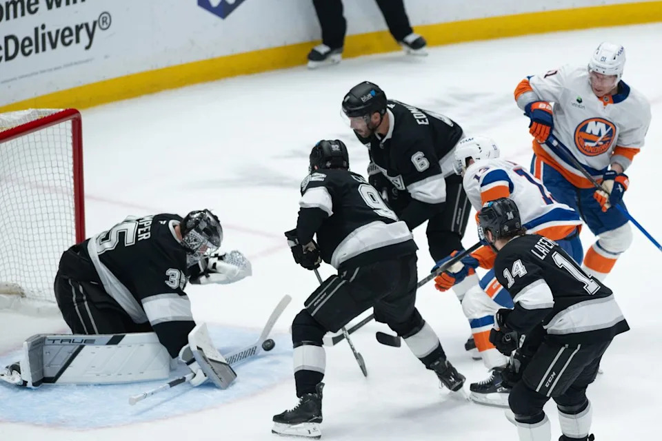 LA Kings goalie Darcy Kuemper (35) makes a save during an NHL game between the New York Islanders and the Los Angeles Kings on Thursday, March 5, 2026 at Crypto.com Arena in Los Angeles Calif