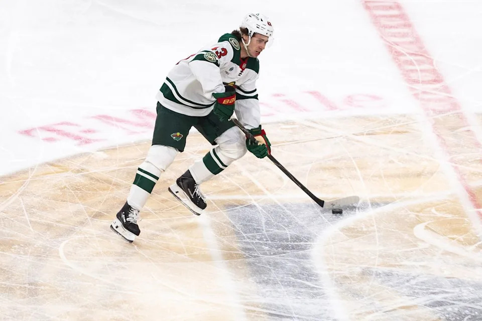 Minnesota Wild defenseman Quinn Hughes (43) skates the puck up center ice during a NHL game between the Vegas Golden Knights and the Minnesota Wild, Friday March 6, 2026 in Las Vegas, Nev.