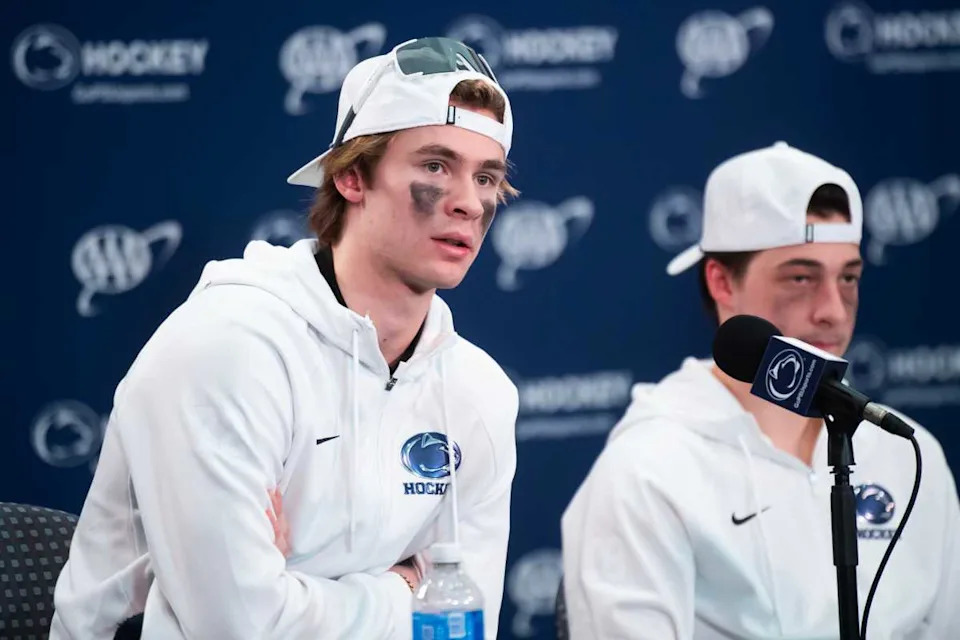 Penn State's Gavin McKenna, left, answers a question during a post-game press conference.© Dan Rainville &sol; USA TODAY NETWORK via Imagn Images