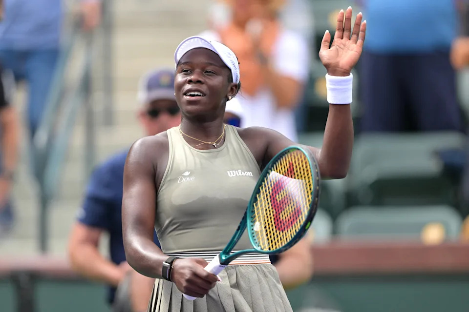 Mar 6, 2026; Indian Wells, CA, USA;  Victoria Mboko (CAN) waves to the crowd after winning her second round match against Kimberly Birrell (AUS) in the BNP Paribas Open at the Indian Wells Tennis Garden. Mandatory Credit: Jayne Kamin-Oncea-Imagn Images
