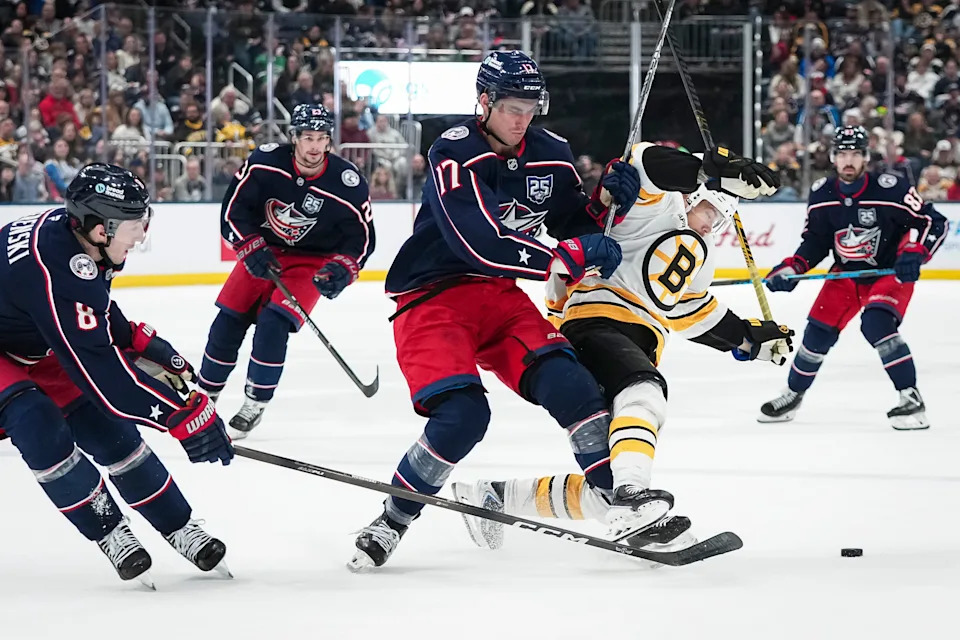Columbus Blue Jackets left wing Mason Marchment (17) collides with Boston Bruins left wing Viktor Arvidsson (71) during the second period of the NHL hockey game at Nationwide Arena on March 29, 2026.