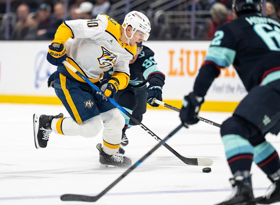Mar 10, 2026; Seattle, Washington, USA; Nashville Predators forward Fedor Svechkov (40) skates with the puck during the first period against the Seattle Kraken at Climate Pledge Arena. Mandatory Credit: Stephen Brashear-Imagn Images