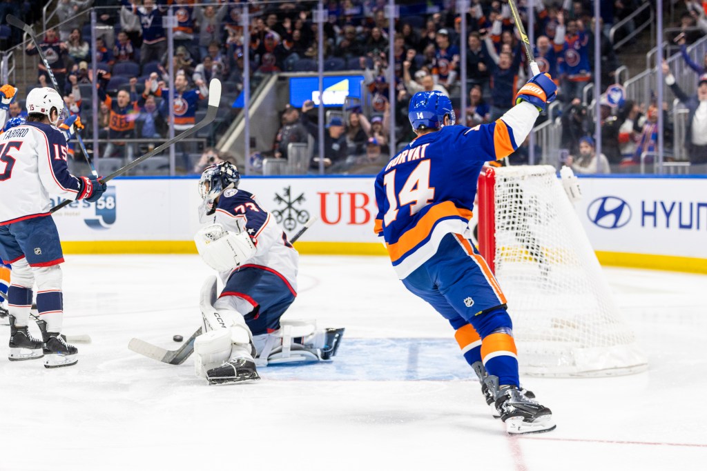 Bo Horvat (14) of the New York Islanders celebrates his goal against Columbus Blue Jackets Goaltender Jet Greaves (73).