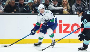 Vancouver Canucks right wing Conor Garland (8) looks to pass in the second period against the Seattle Kraken during an NHL hockey game Saturday, Feb. 28, 2026, in Seattle. (AP Photo/Kevin Ng)