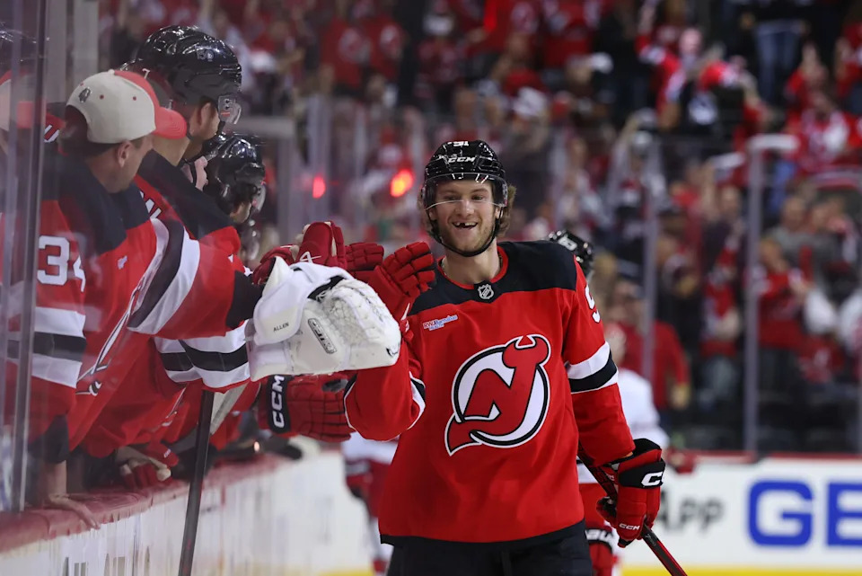 Apr 25, 2025; Newark, New Jersey, USA; New Jersey Devils center Dawson Mercer (91) celebrates his goal against the Carolina Hurricanes during the third period in game three of the first round of the 2025 Stanley Cup Playoffs at Prudential Center. Mandatory Credit: Ed Mulholland-Imagn Images