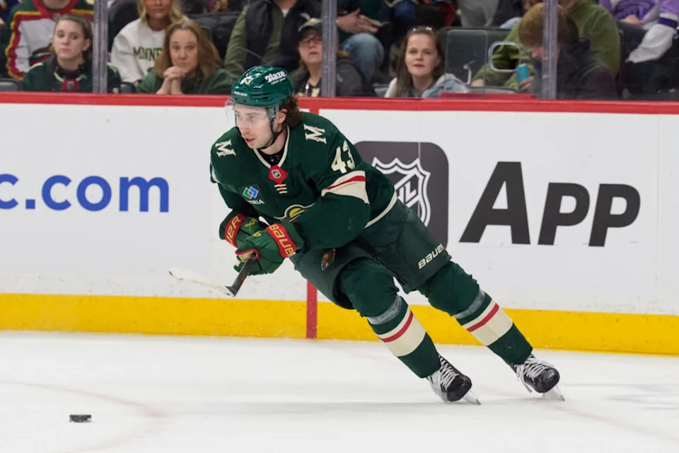 Mar 1, 2026; Saint Paul, Minnesota, USA; Minnesota Wild defenseman Quinn Hughes (43) plays the puck against the St. Louis Blues in the first period at Grand Casino Arena. Mandatory Credit: Matt Blewett-Imagn Images