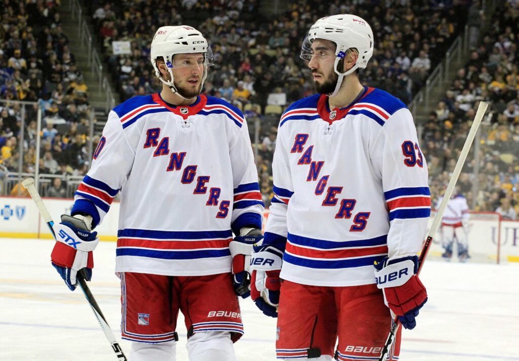 New York Rangers left wing J.T. Miller (10) and center Mika Zibanejad (93).